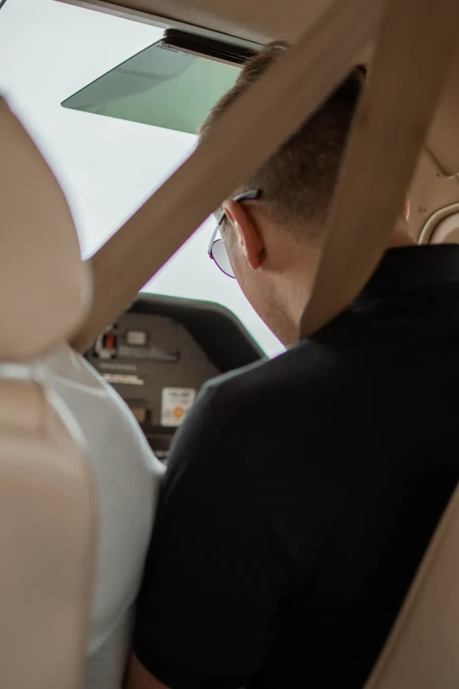 Instruction in the cockpit, seen from the back seat