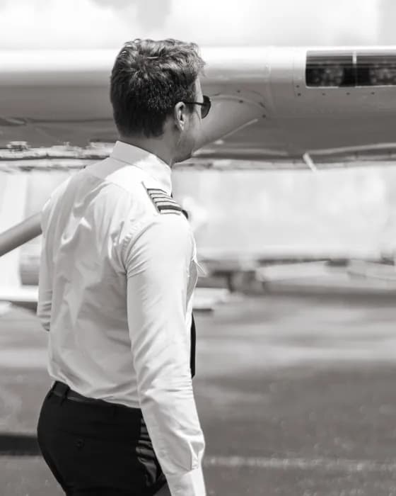 Pierre-Antoine Terrazzoni walking out to the aircraft before a flight